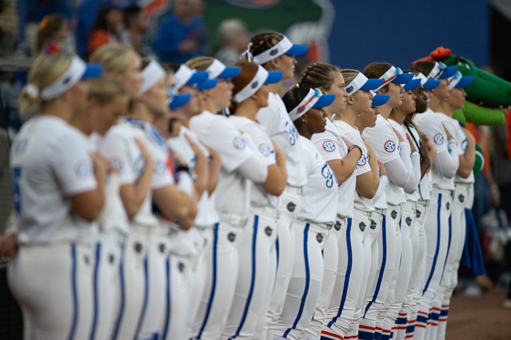 The Florida Gators women’s softball team stands for the national anthem before their home opener at Katie Seashole Pressly Stadium against North Florida on Feb. 6, 2025.