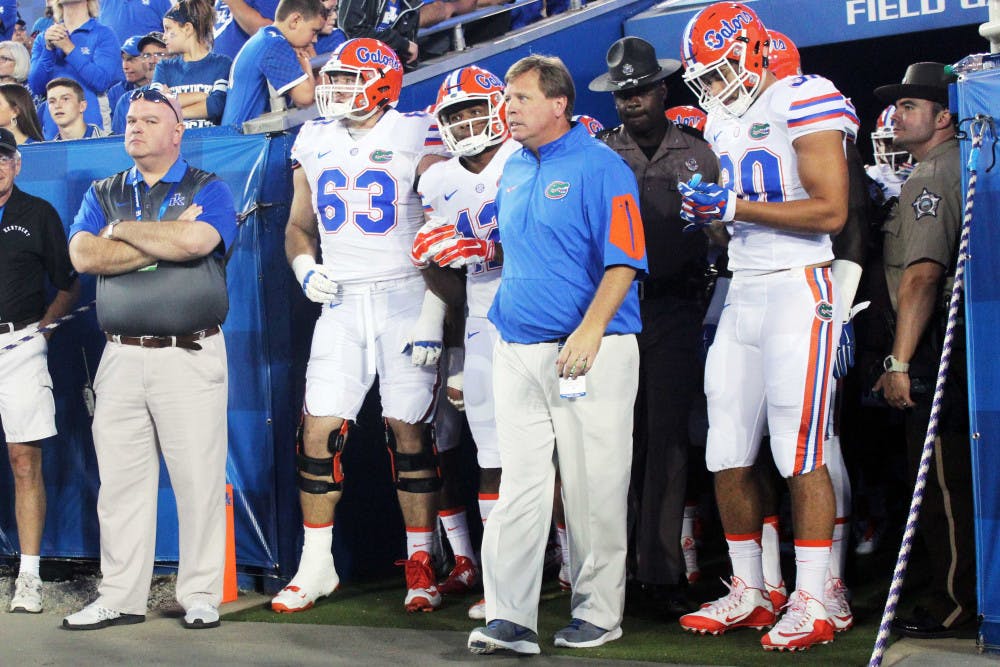 UF football coach Jim McElwain walks out of the visitor's tunnel prior to Florida's 14-9 win against Kentucky on Sept. 19, 2015, at Commonwealth Stadium in Lexington, Kentucky.