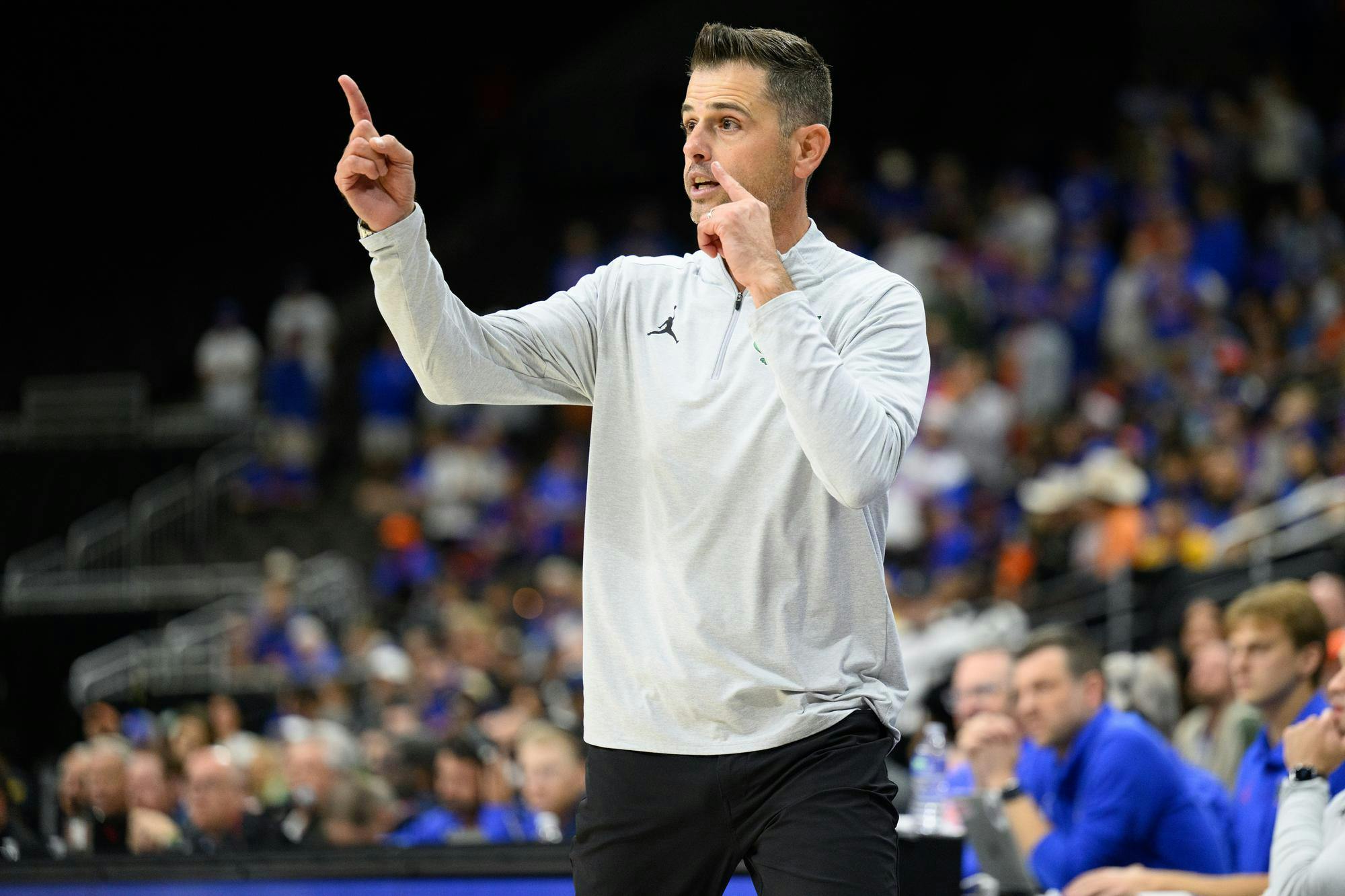 Florida head coach Todd Golden signals to his team during overtime of an NCAA men's basketball exhibition game against Baylor, Sunday, Oct. 18, 2026, in Jacksonville, Fla.