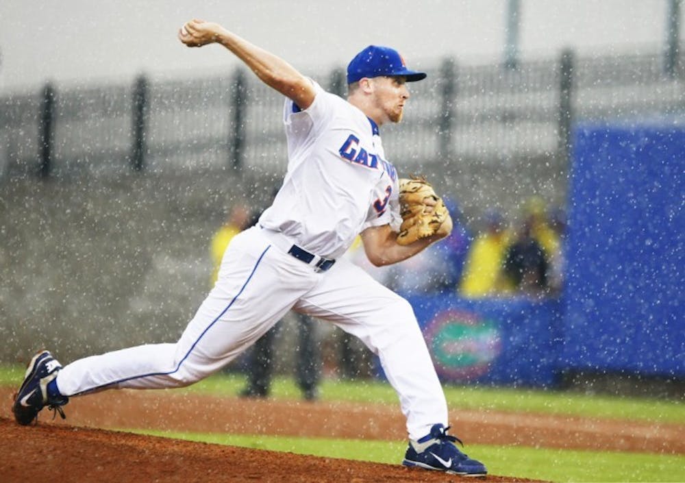 <p>Greg Larson pitches against North Carolina State in the first game of the NCAA Super Regional on June 9. The senior pitcher has been to the College World Series three times during his career at Florida.</p>