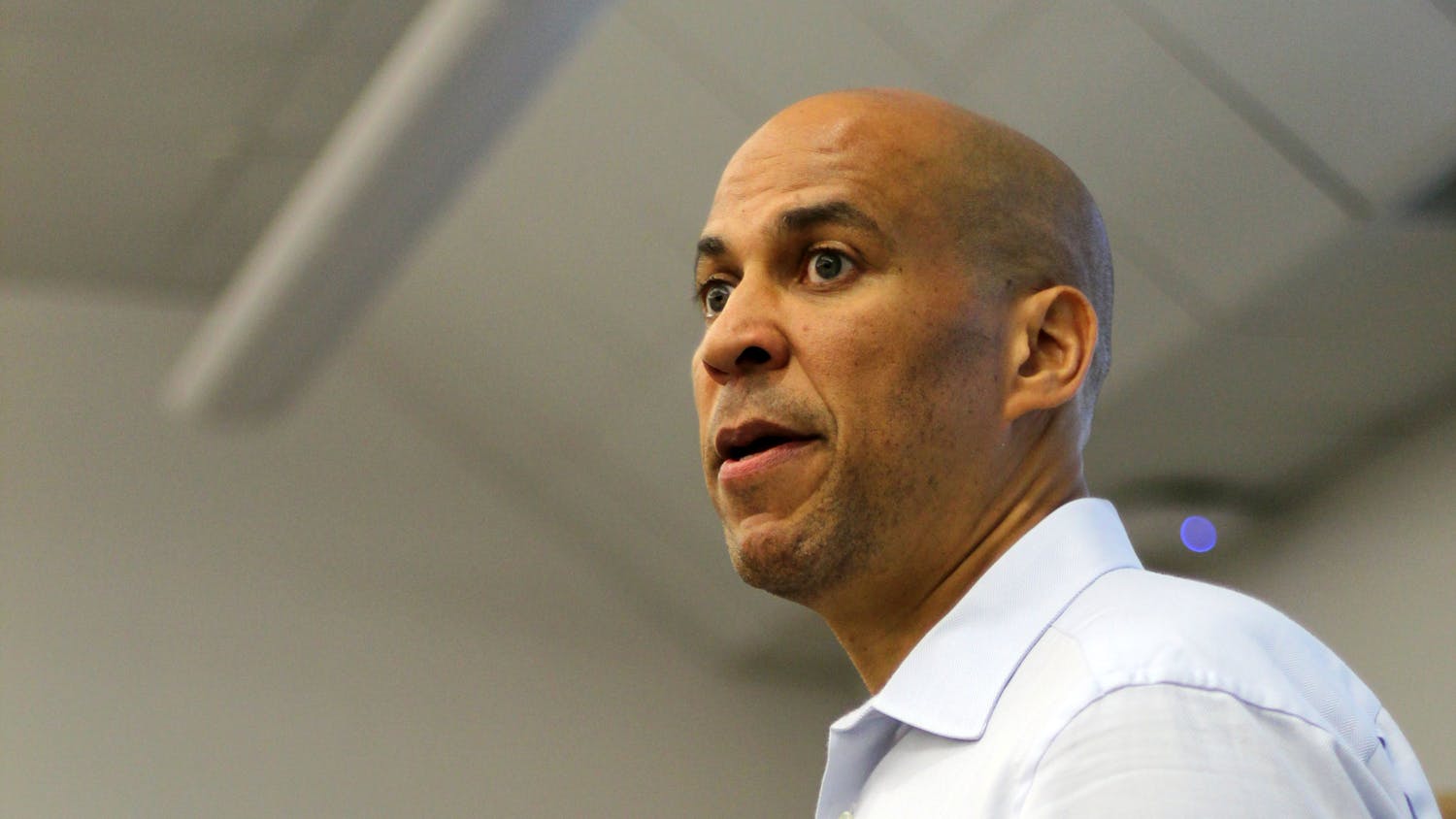 New Jersey Senator Cory Booker joins Senator Bill Nelson at a UF College Democrats meeting on Oct. 19 at Weil Hall. Students asked them questions about policies and their thoughts on current issues in the Senate.