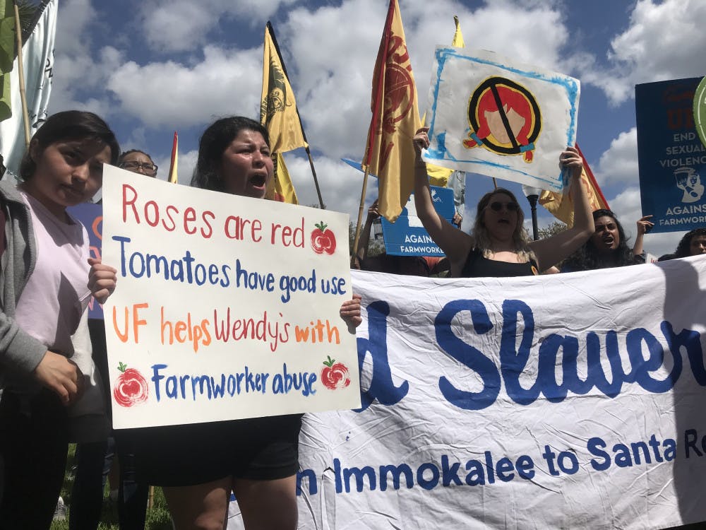 <p>Students, organizers and Immokalee workers marched through campus from Norman Field to Tigert Hall Thursday to urge UF to remove the Wendy’s from campus.</p>