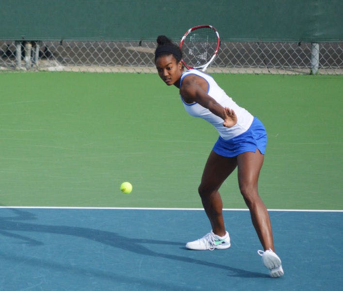 Brianna Morgan swings at the ball during Florida’s 4-0 win against Harvard on Jan. 26 at the Ring Tennis Complex.