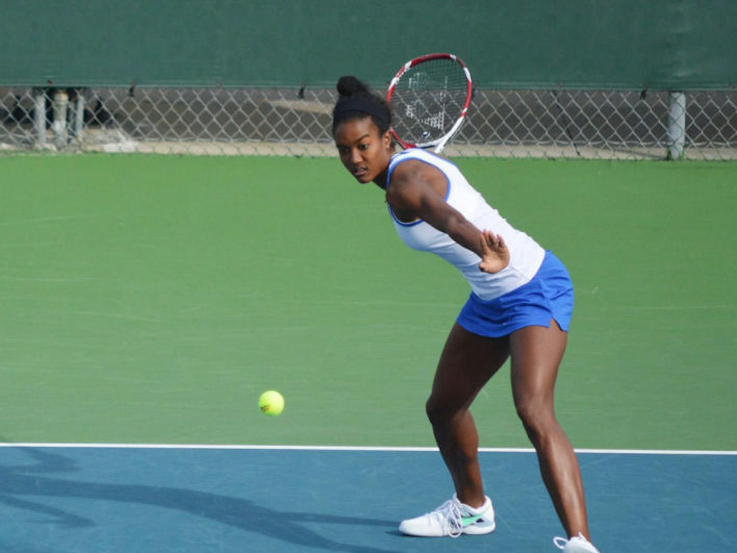 Brianna Morgan swings at the ball during Florida’s 4-0 win against Harvard on Jan. 26 at the Ring Tennis Complex.