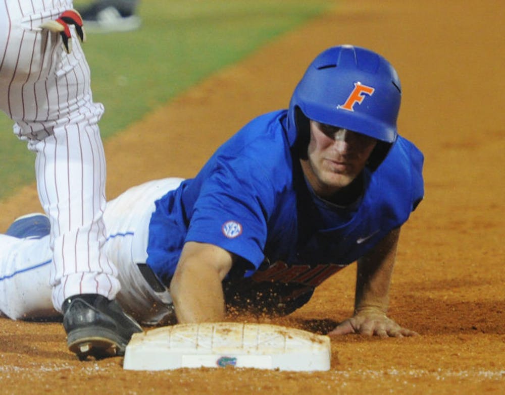 <p>Braden Mattson dives toward first base during Florida’s 1-0 win against Arkansas on March 15 at McKethan Stadium. Mattson recorded one RBI and one run during UF’s 4-2 loss to Kentucky on Wednesday.</p>