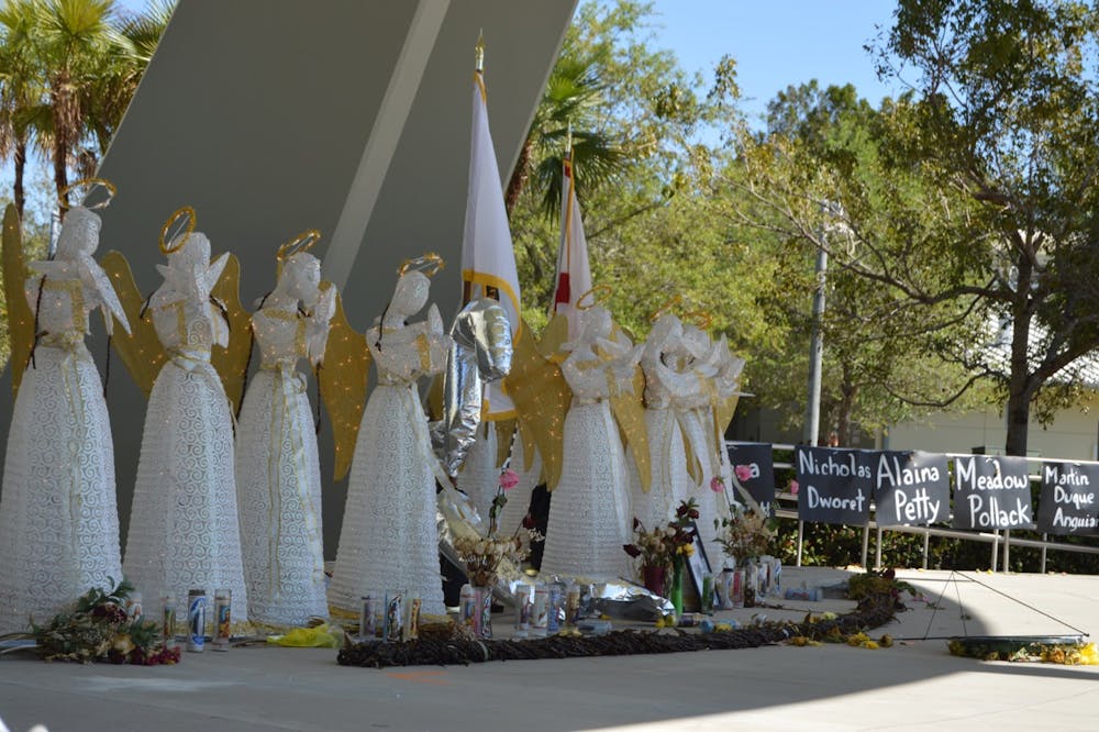 <p dir="ltr"><span>Seventeen angel statues face outward at the memorial at Pine Trails Park in Parkland, Florida. The statues were put up for the vigil the day after the shooting.</span></p><p><span> </span></p>