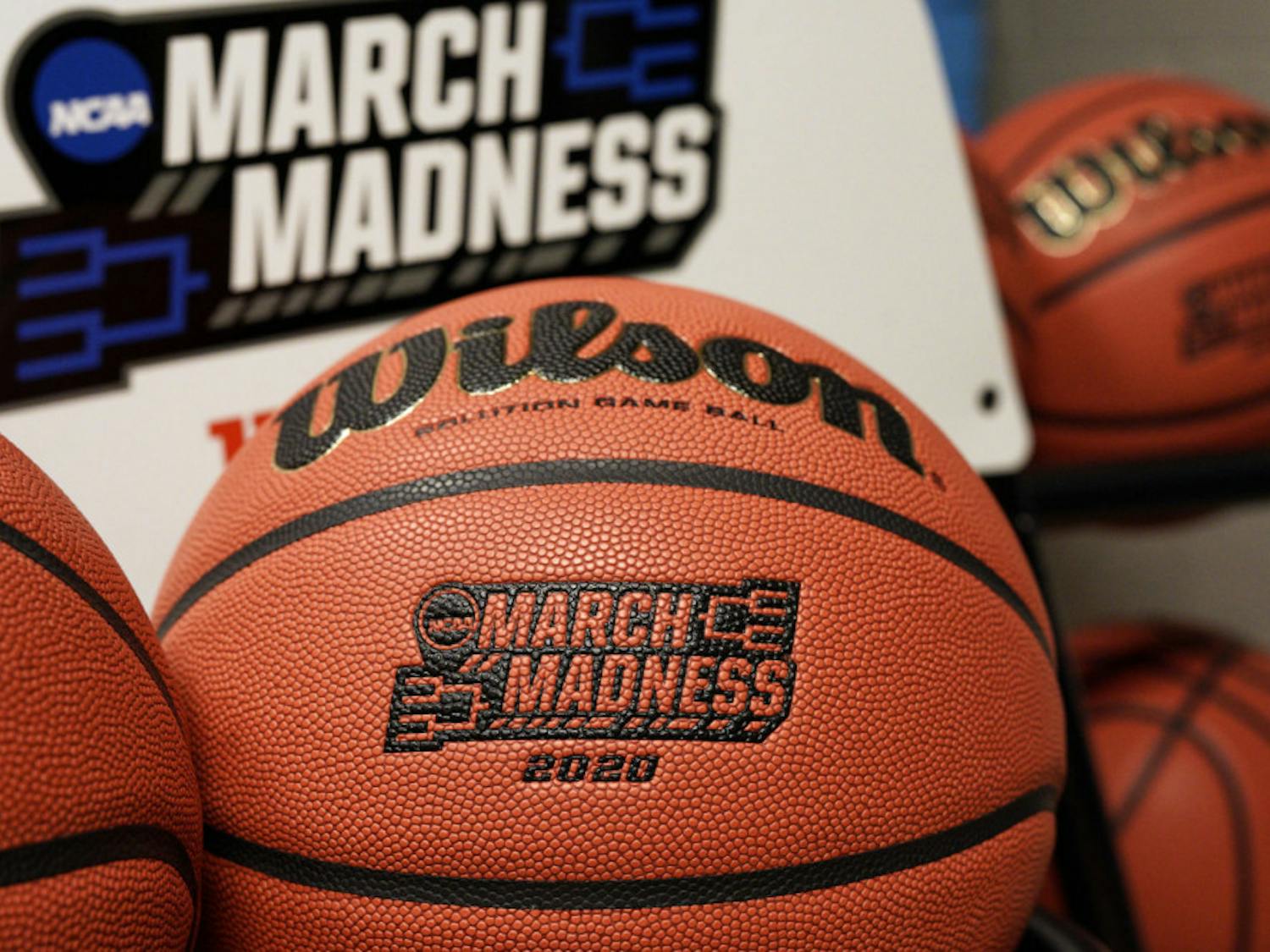 Official March Madness 2020 tournament basketballs are seen in a store room at the CHI Health Center Arena, in Omaha, Neb., Monday, March 16, 2020. Omaha was to host a first and second round in the NCAA college basketball Division I tournament, which was cancelled due to the coronavirus pandemic.