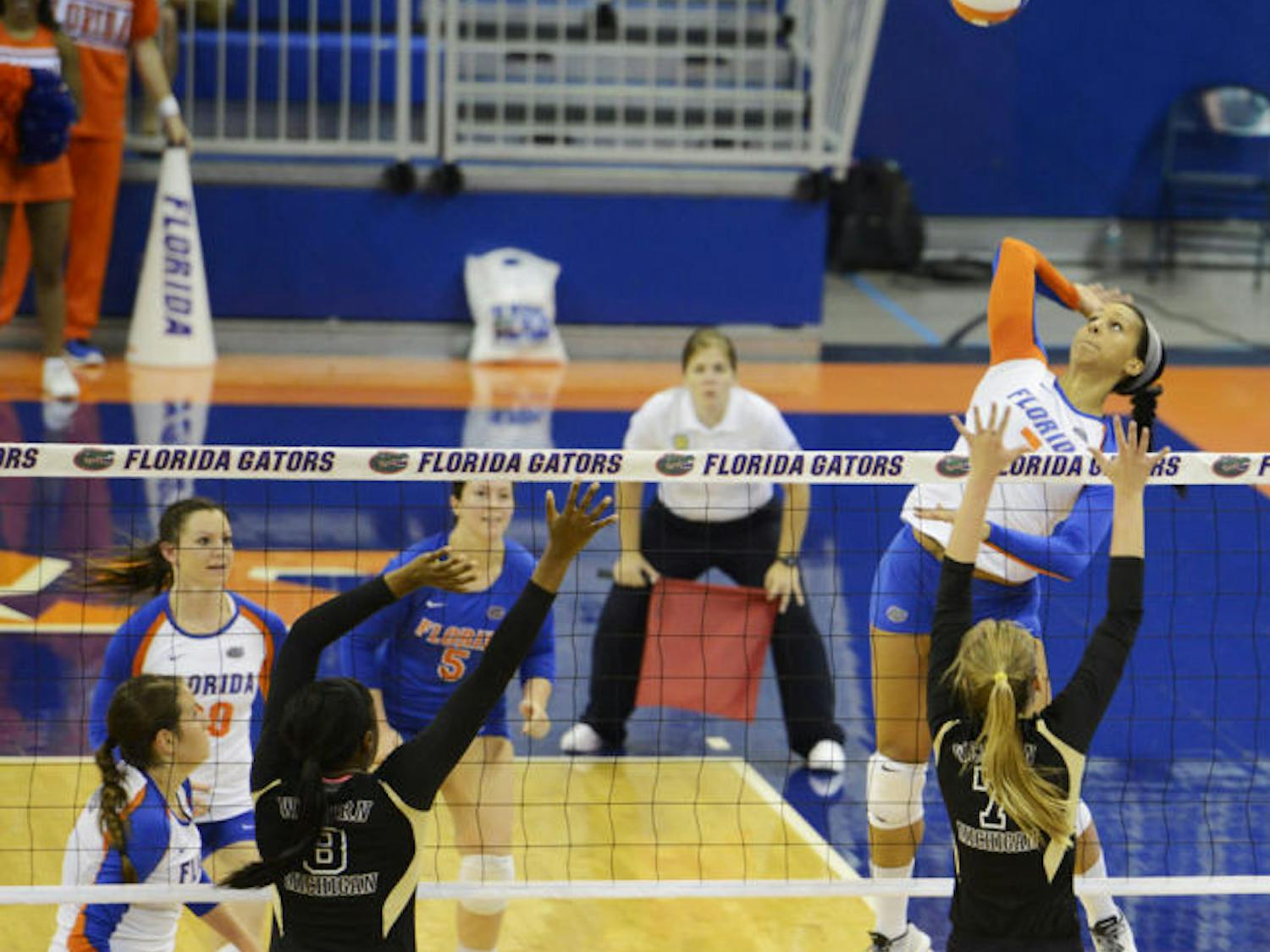 Gabby Mallette prepares to hit the ball during Florida’s four-set victory against Western Michigan on Sept. 14 in the O’Connell Center. The sophomore outside hitter totaled 17 kills last weekend.