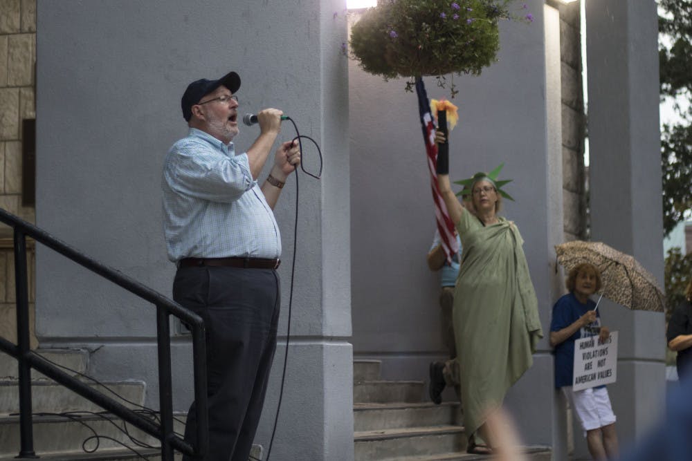<p>At a recent Gainesville protest, City Commissioner Harvey Ward asked the crowd to support the city joining the lawsuit. </p>