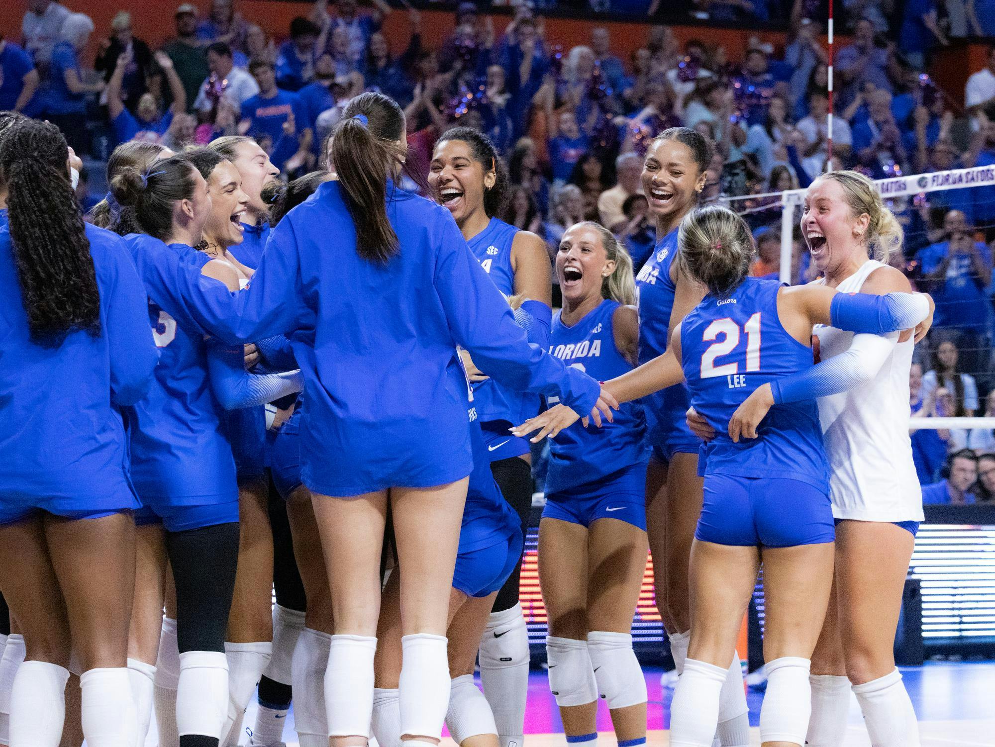 Florida women’s volleyball players celebrate a win during an NCAA volleyball game against Tennessee, Friday, Oct. 2, 2026, in Gainesville, Fla.