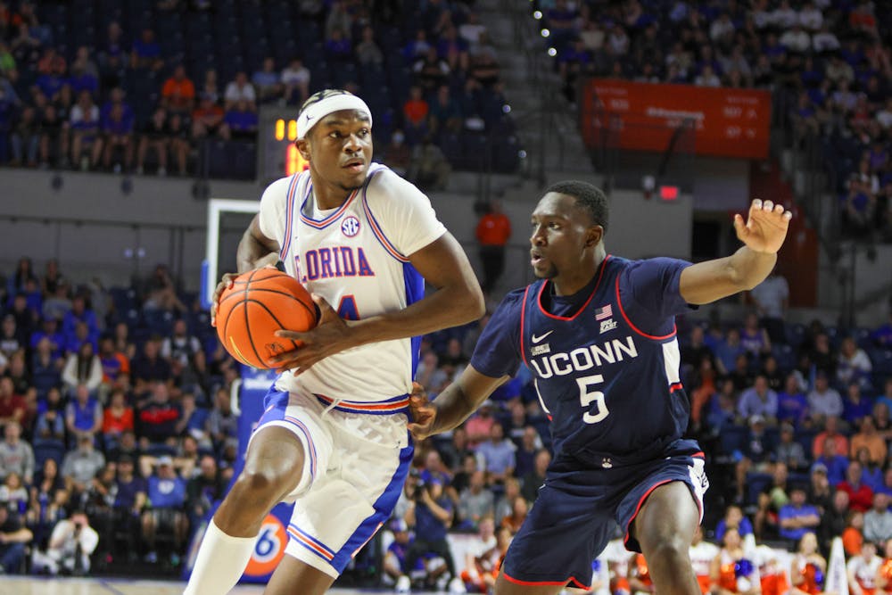 Sophomore guard Kowacie Reeves handles the ball in Florida's 75-54 loss to the No. 5 Connecticut Huskies Wednesday, Dec. 7, 2022. Reeves ended the game with 20 points against the Ohio Bobcats Wednesday, Dec. 14, 2022.