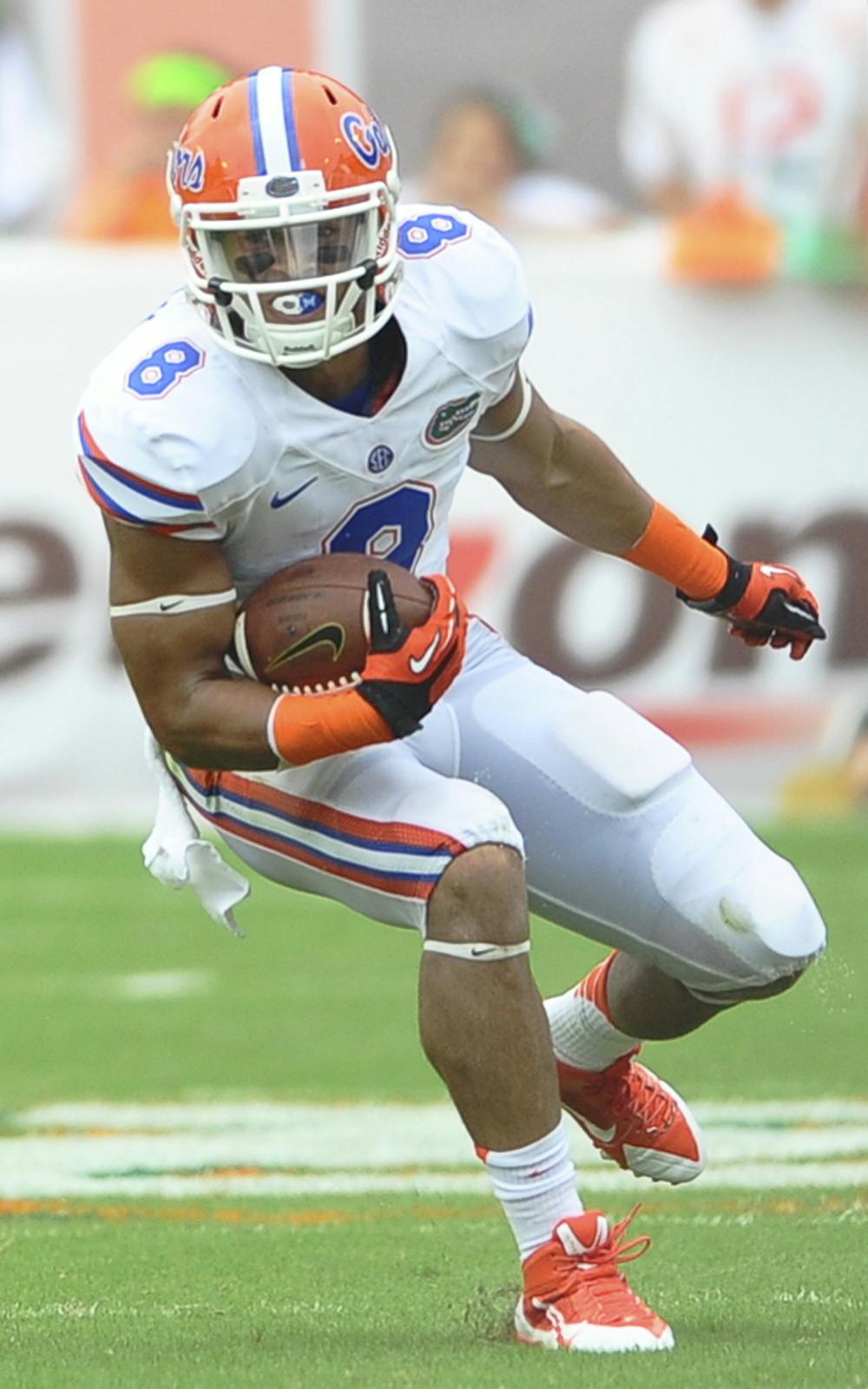 <p>Senior wide receiver Trey Burton runs down the field during Florida’s 21-16 loss to Miami on Sept. 7 in Sun Life Stadium. </p>