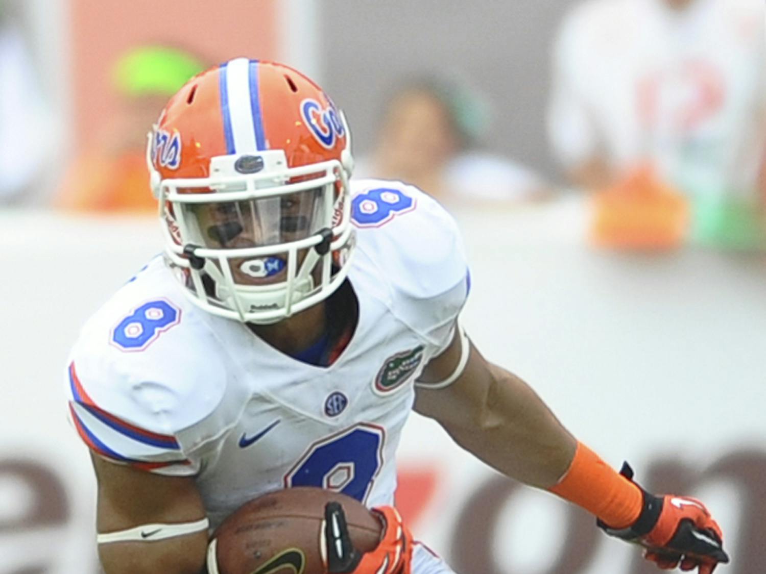 Senior wide receiver Trey Burton runs down the field during Florida’s 21-16 loss to Miami on Sept. 7 in Sun Life Stadium.