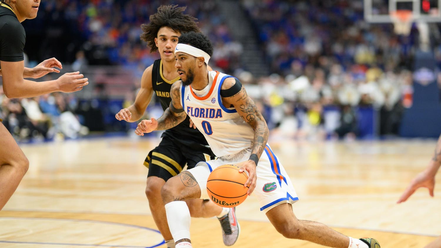 Florida guard Boogie Fland (0) drives during the second half of an SEC Men's Basketball Tournament semifinal game against Vanderbilt, Saturday, March 14, 2026, in Nashville, Tenn.