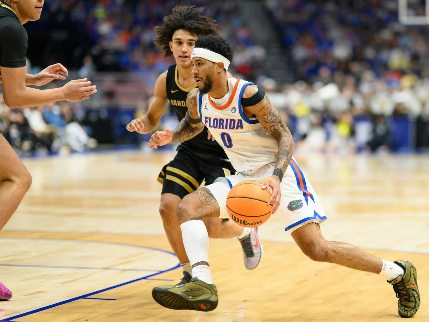 Florida guard Boogie Fland (0) drives during the second half of an SEC Men's Basketball Tournament semifinal game against Vanderbilt, Saturday, March 14, 2026, in Nashville, Tenn.