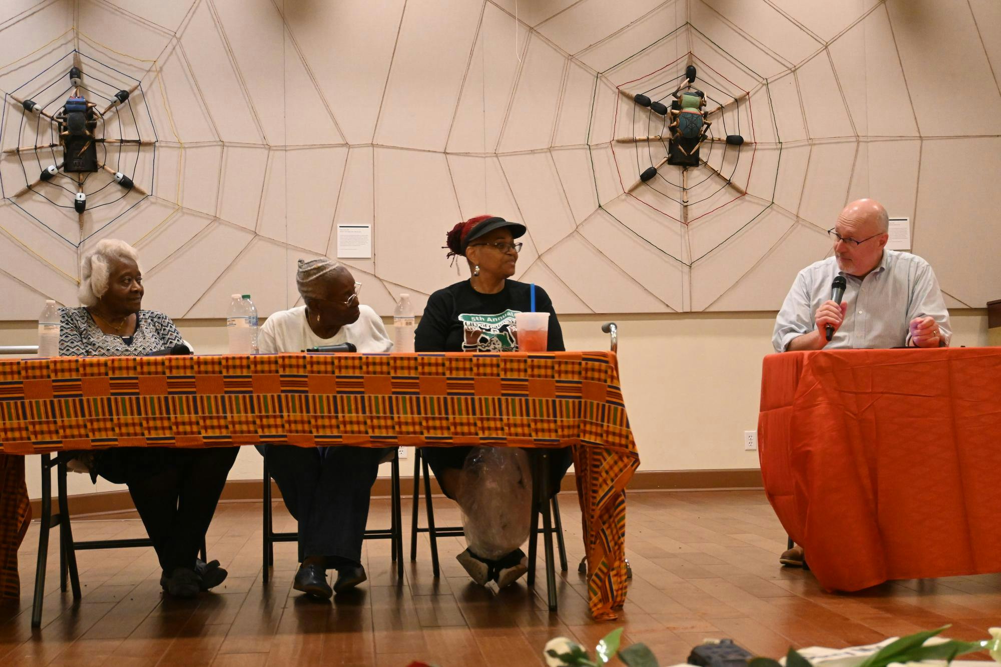 From left to right: Sarah Brown, Jean Kiner and Caroline Barber speak in an emancipation day panel with Mayor Harvey Ward at the Cotton Club Museum on May 23, 2026 in Gainesville, Fla.