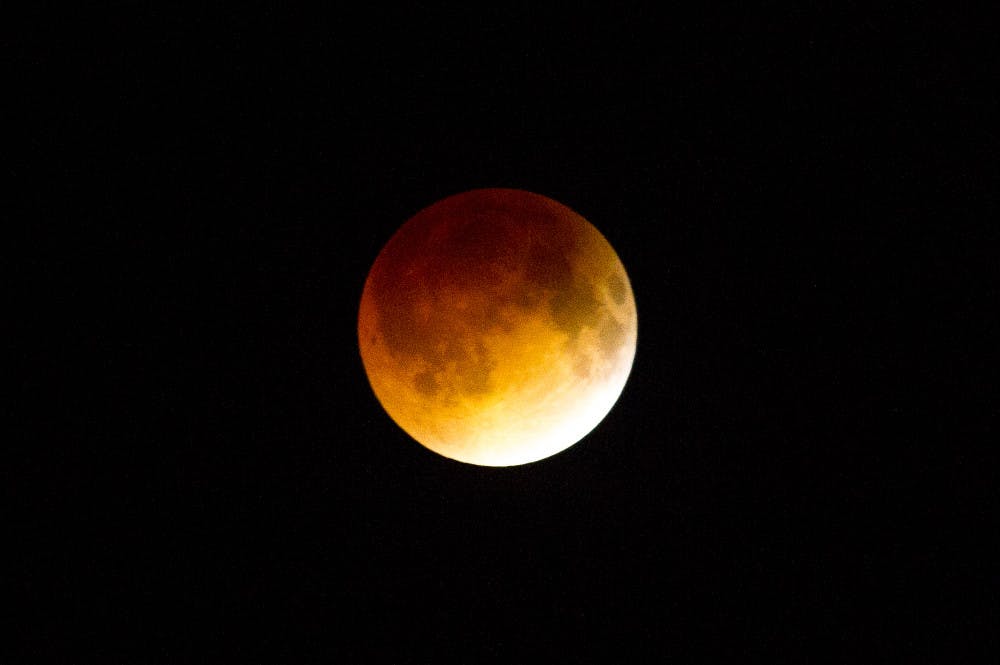 The blood moon, caused by a total lunar eclipse, was visible at about 3 a.m. today for the first time since 2010. 