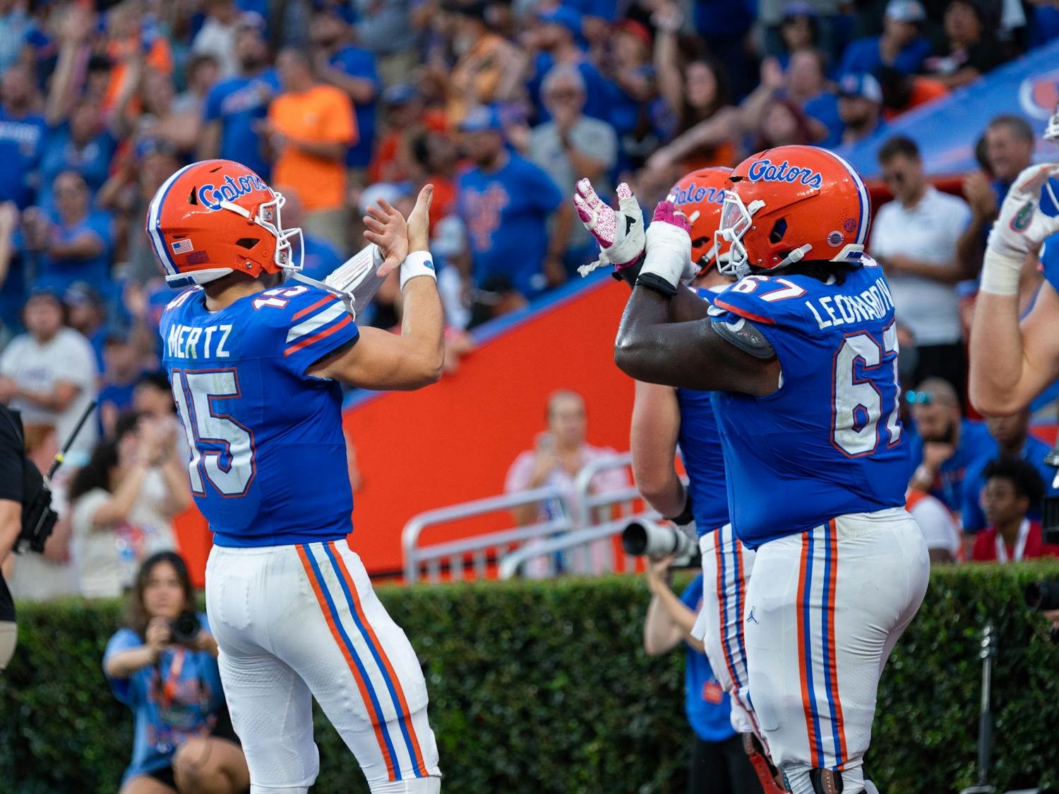 Redshirt junior quarterback Graham Mertz and junior offensive lineman Richie Leonard IV celebrate a Florida touchdown in the Gators' 38-14 win against the Vanderbilt Commodores on Saturday, Oct. 7, 2023.