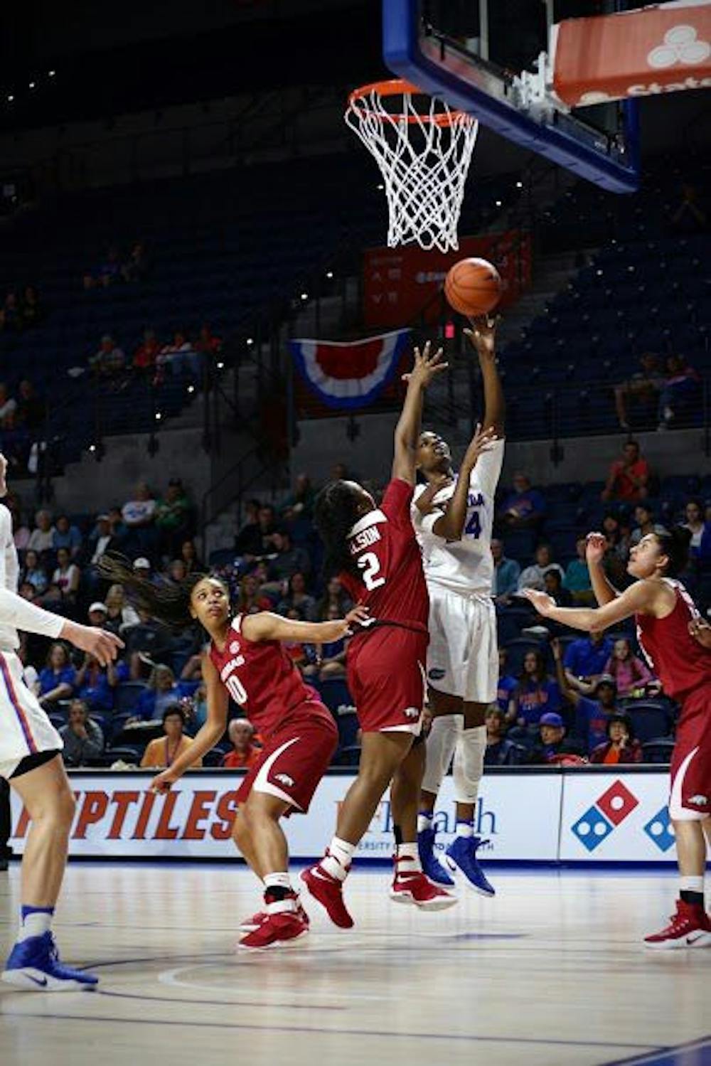 <p>UF center Tyshara Fleming attempts a lay-up during Florida's 57-53 win against Arkansas on Feb. 9, 2017, in the O'Connell Center.&nbsp;</p>