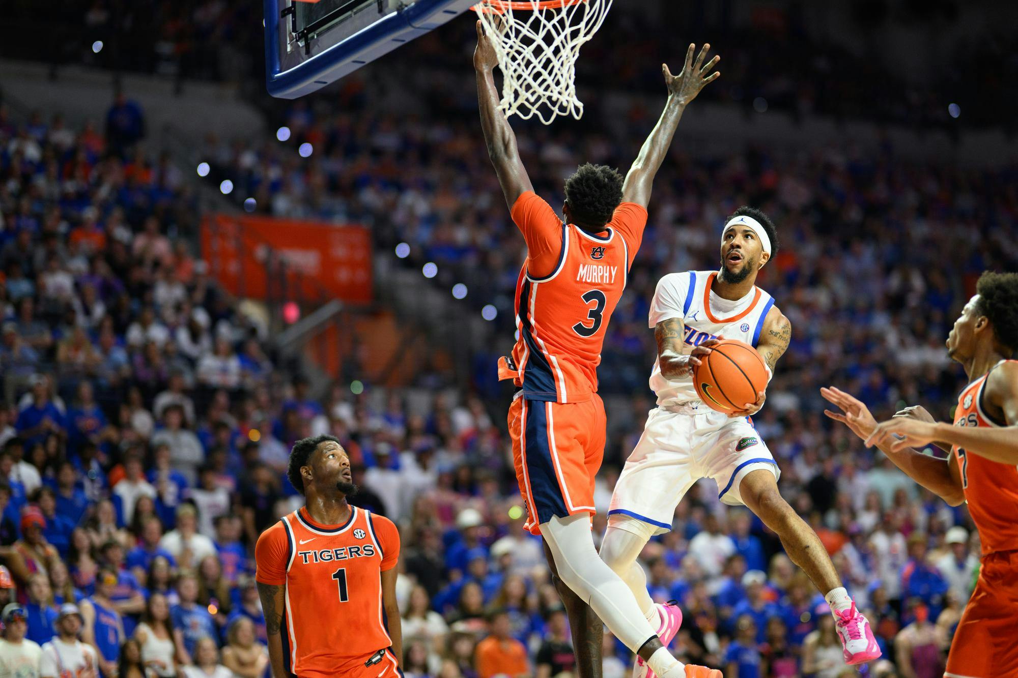 Florida guard Boogie Fland (0) shoots a reverse layup during the first half of an NCAA college basketball game against Auburn, Saturday, Jan. 24, 2026, in Gainesville, Fla.