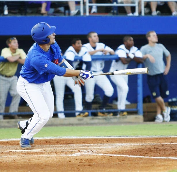 Catcher Mike Zunino homers to center field against Georgia Tech. His solo shot gave the Gators a 2-1 lead in the fourth inning en route to a 6-2 win.
