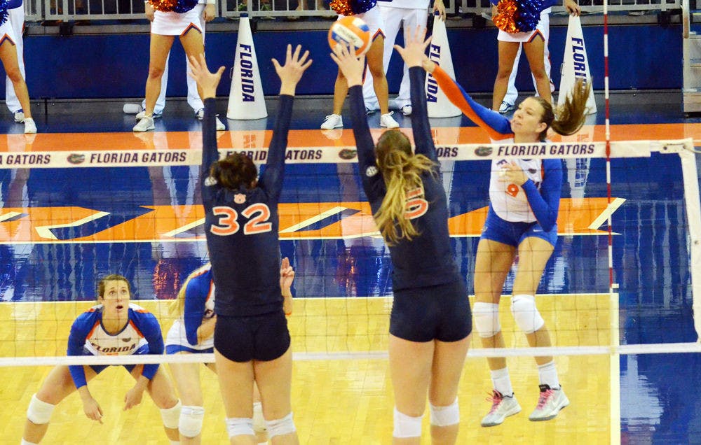 <p>Ziva Recek swings for a kill attempt during Florida's 3-0 win against Auburn on Wednesday in the O'Connell Center</p>