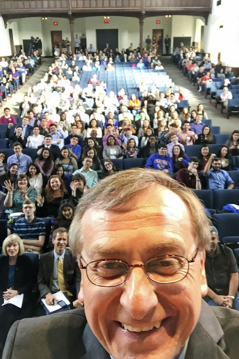 <p>Fuchs takes a selfie in the University Auditorium at the Innovation Academy convocation Jan. 5.</p>