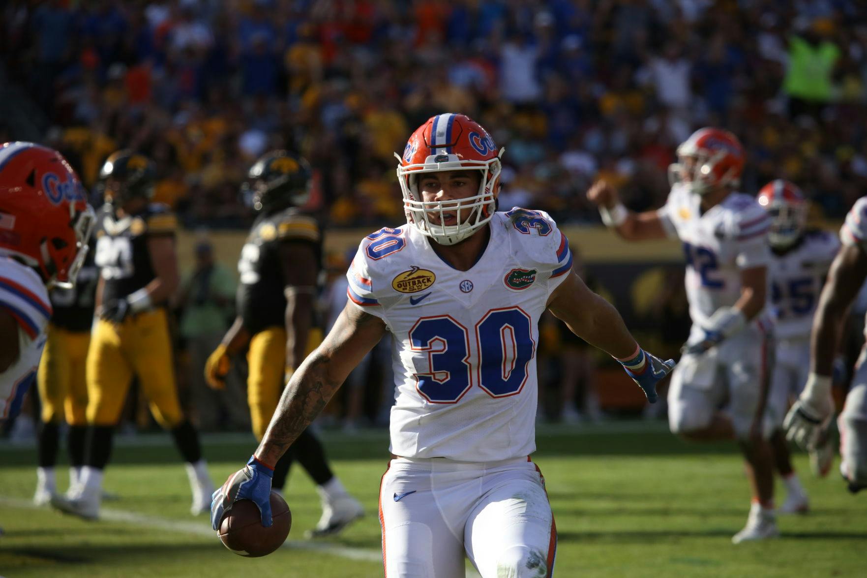 DeAndre Goolsby runs out of bounds after catching a pass during UF's 30-3 win against Iowa at the Outback Bowl on Jan. 2, 2017, at Raymond James Stadium.
