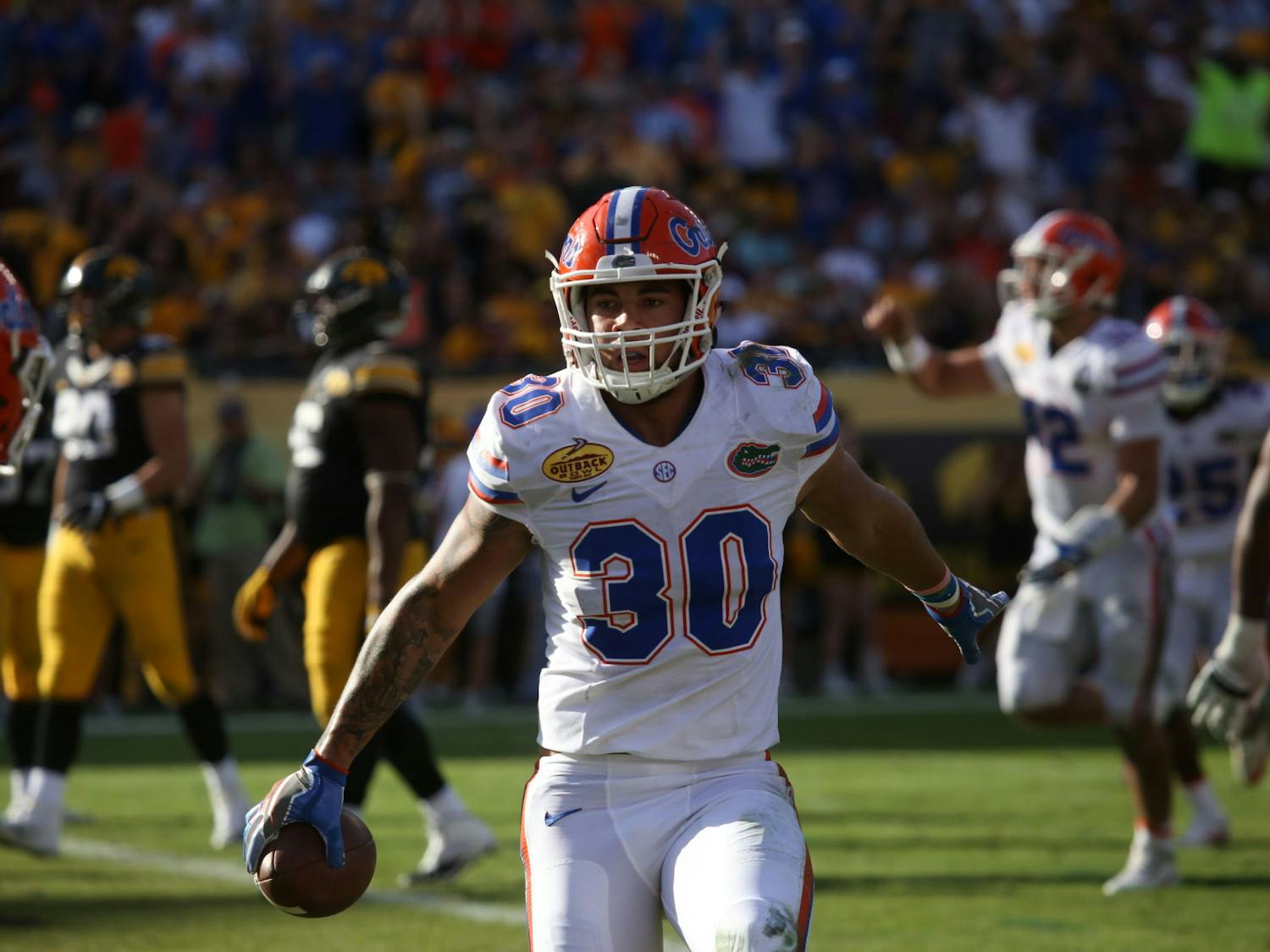 DeAndre Goolsby runs out of bounds after catching a pass during UF's 30-3 win against Iowa at the Outback Bowl on Jan. 2, 2017, at Raymond James Stadium.