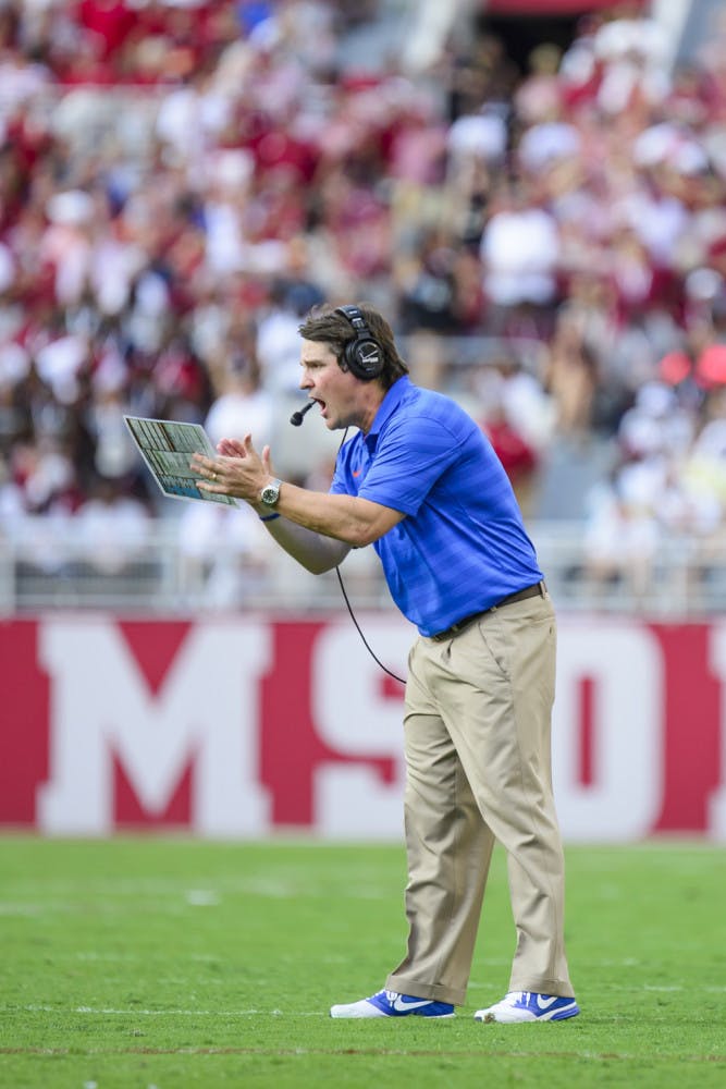 Will Muschamp reacts after a play during Florida's 42-21 loss to Alabama on Saturday at Bryant-Denny Stadium.