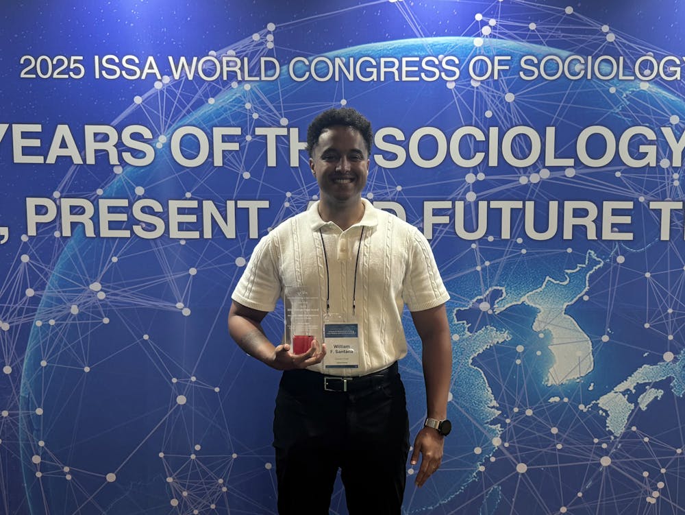 William Ferraz de Santana poses with the Graduate Paper Award at the International Sociology of Sport Association Conference in Seoul, South Korea on Wednesday, July 9, 2025. 

