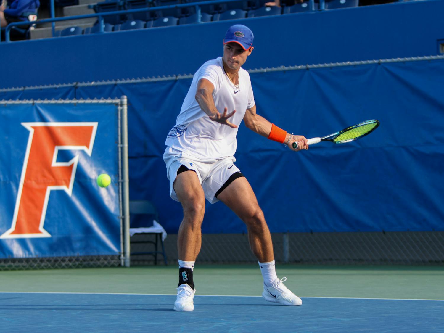 Florida graduate student Axel Nefve swings his racket in the Gators' 6-1 win over the Arkansas Razorbacks Friday, March 24, 2023.