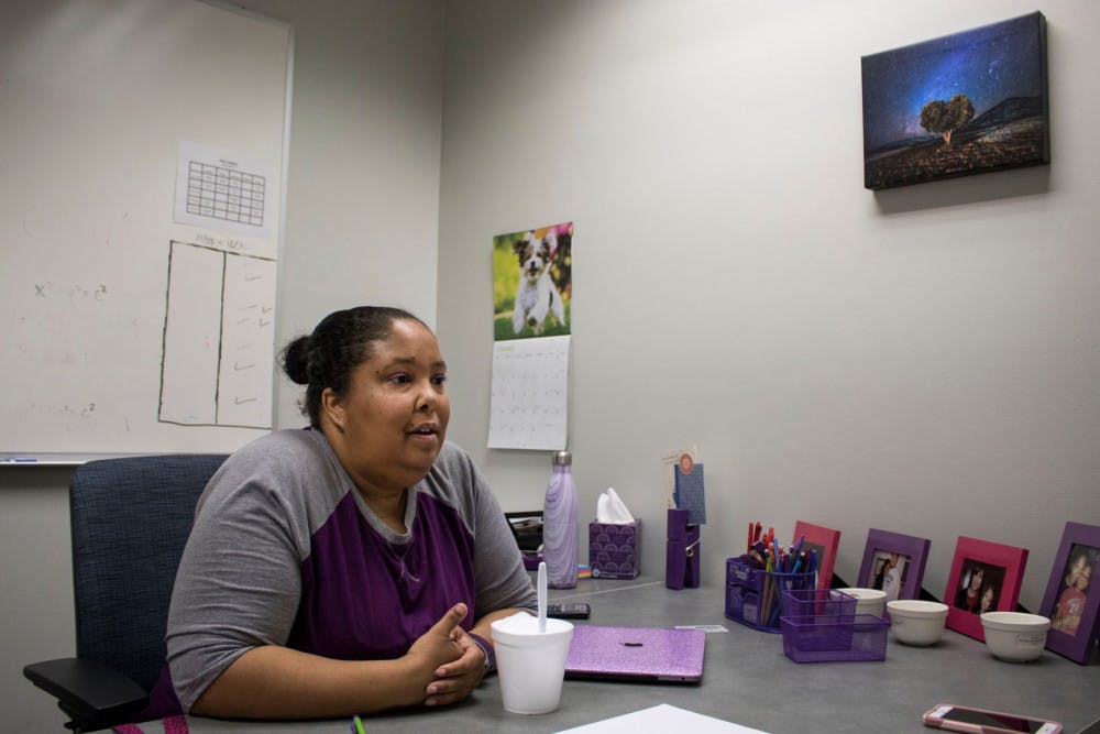 Melissa Shabazz, a UF math lecturer, works in her office Saturday in Little Hall. Shabazz is the only African American professor in her department. She started working at UF during Fall 2018.
