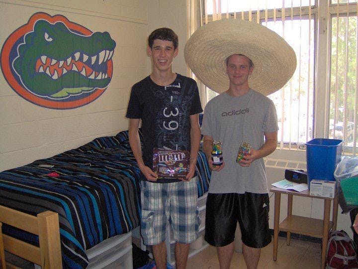 Ryan Murphy (left) and Jeff Wood (right) pose in their dorm room in Simpson Hall during their freshman year, in 2010. (Courtesy of Ryan Murphy)
