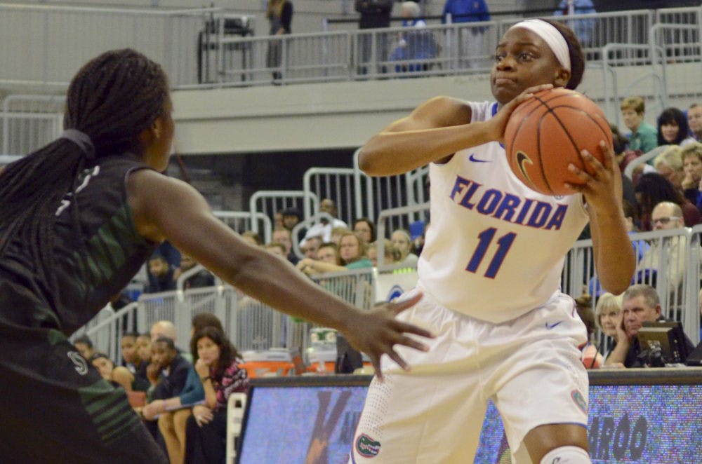 <p>UF guard Dyandria Anderson looks to pass during Florida's 59-54 win against Stetson on Dec. 14, 2014, in the O'Connell Center.</p>