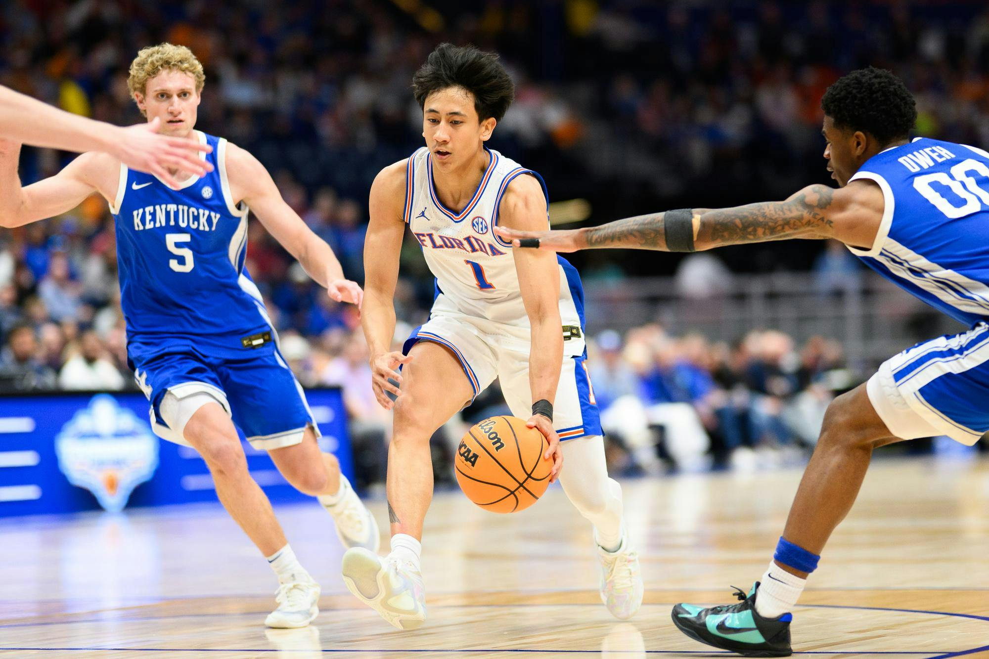 Florida guard Xaivian Lee (1) drives during the second half of an SEC Men's Basketball Tournament quarterfinal game against Kentucky, Friday, March 13, 2026, in Nashville, Tenn.