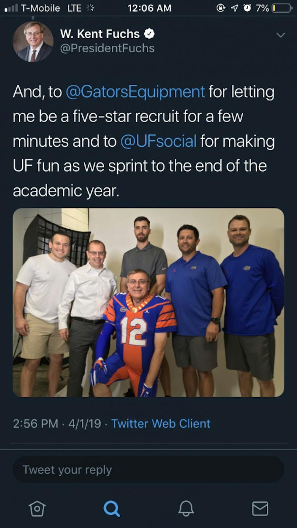 <p>UF President Kent Fuchs poses in a football uniform designed to resemble his graduation robe his annual April Fools' Day prank.</p>