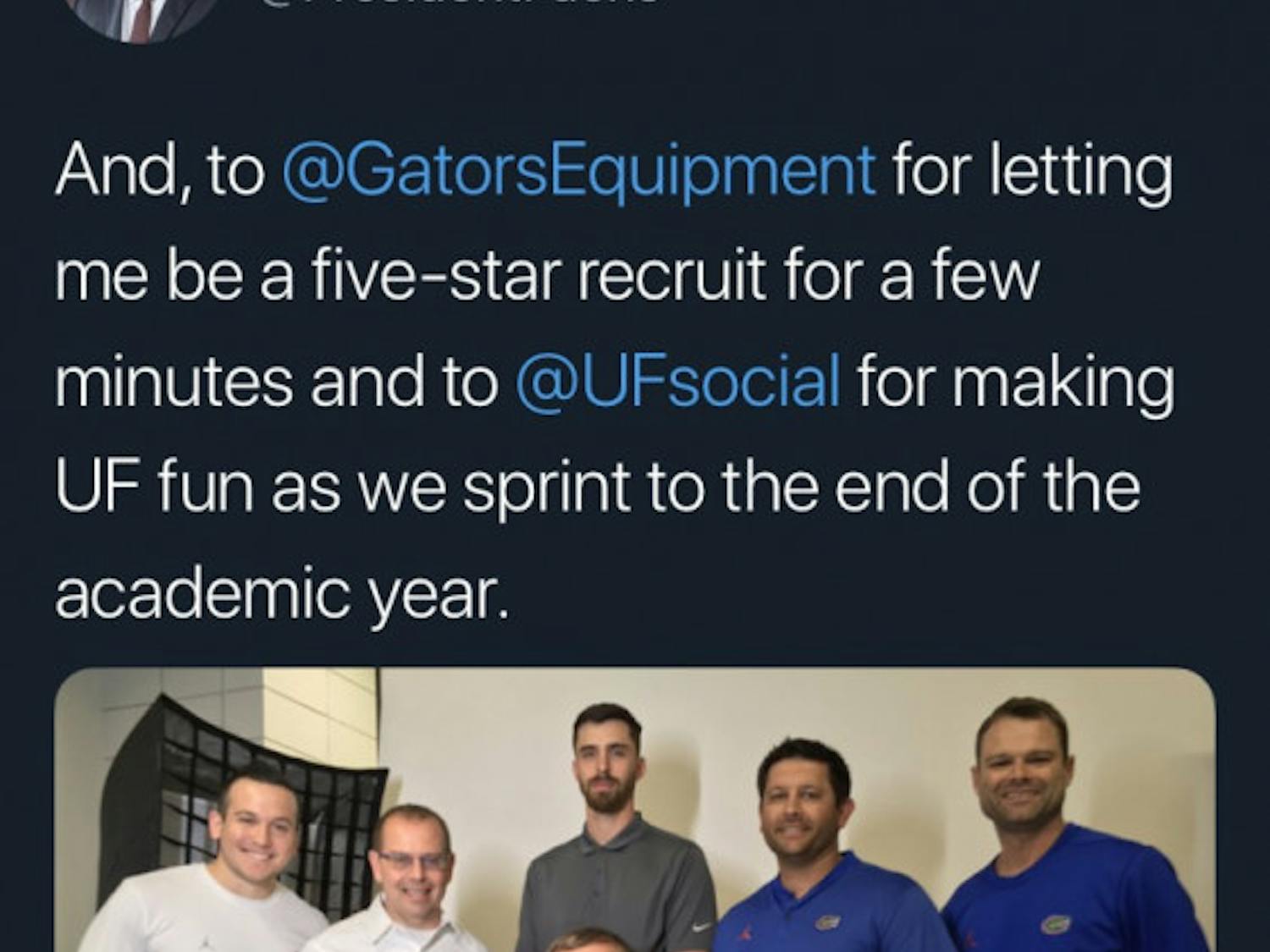 UF President Kent Fuchs poses in a football uniform designed to resemble his graduation robe his annual April Fools' Day prank.