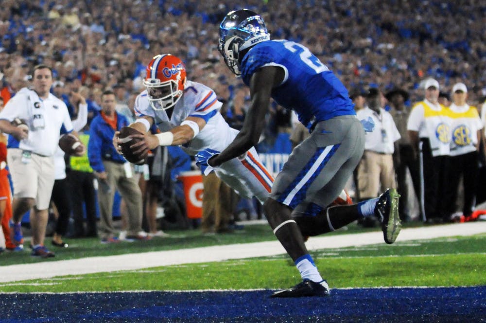 <p>UF quarterback Will Grier dives into the end zone for a touchdown during Florida's 14-9 win against Kentucky on Sept. 19, 2015, at Commonwealth Stadium in Lexington, Kentucky.</p>