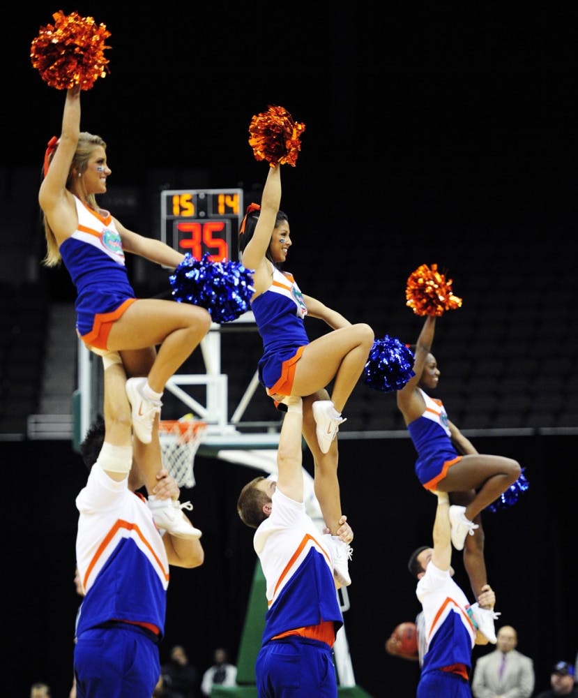 Florida Cheerleaders perform during the Gators’ basketball game against Rider University at the Jacksonville Veterans Memorial Arena in 2011.