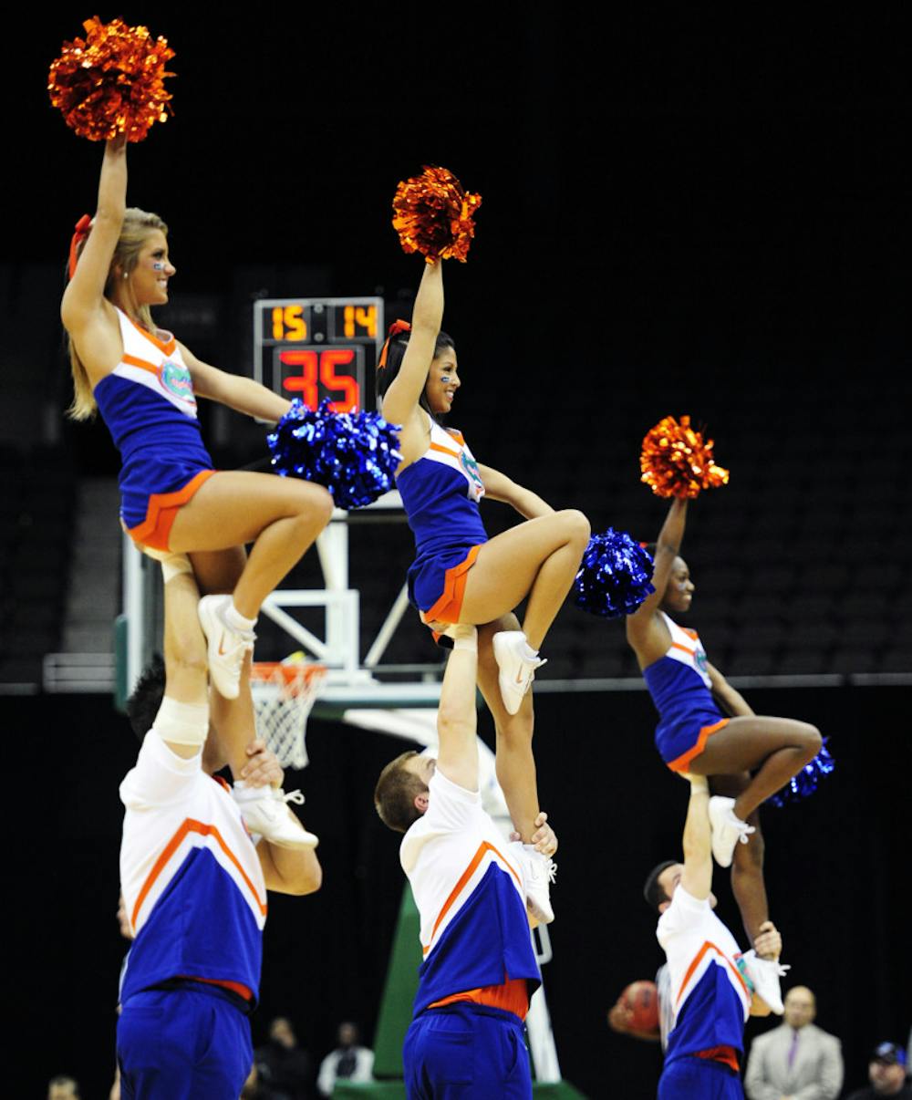 <p>Florida Cheerleaders perform during the Gators’ basketball game against Rider University at the Jacksonville Veterans Memorial Arena in 2011.</p>