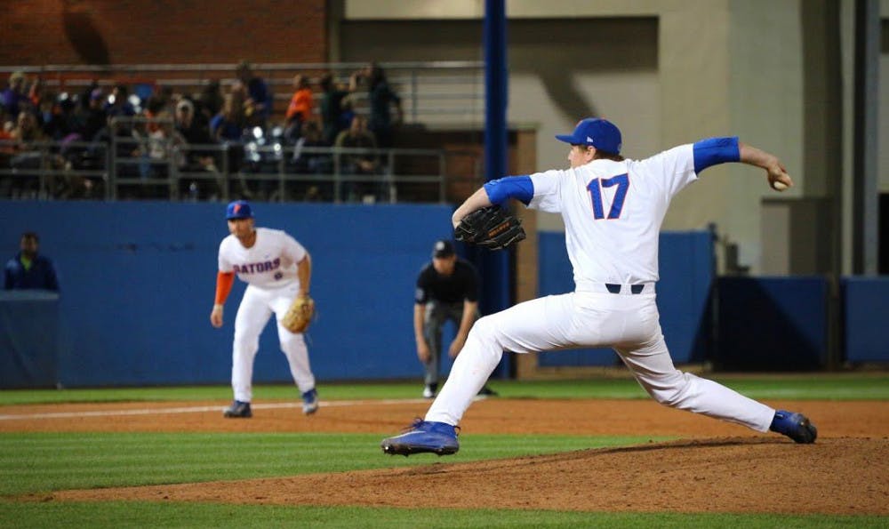 <p>UF reliever Michael Byrne throws a pitch during Florida's 1-0 win against LSU on Friday at McKethan Stadium.</p>