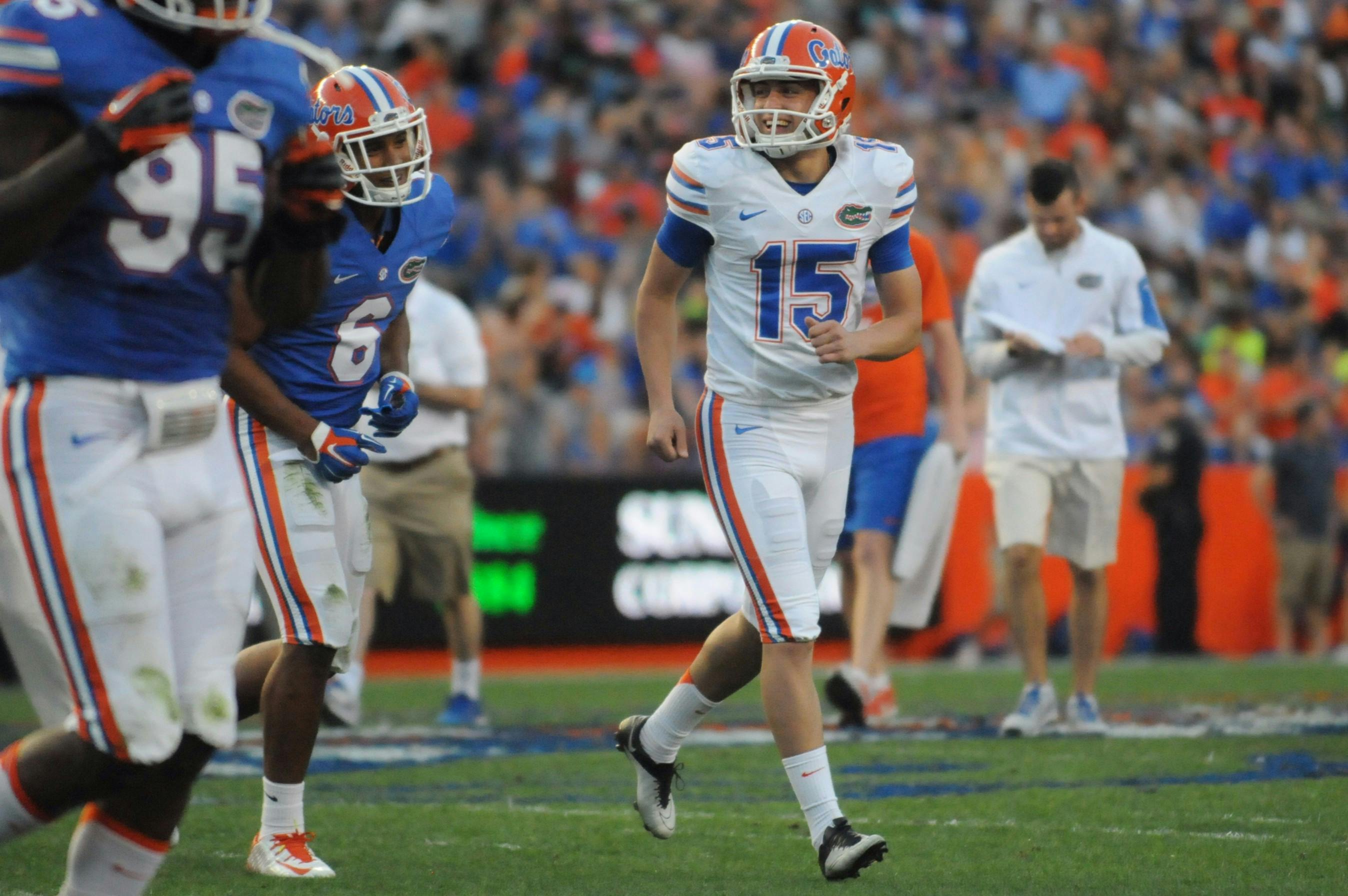 Eddy Pineiro (15) smiles as he walks off the field after making a field goal during the Orange &amp; Blue Debut on April 8, 2016, at Ben Hill Griffin Stadium.