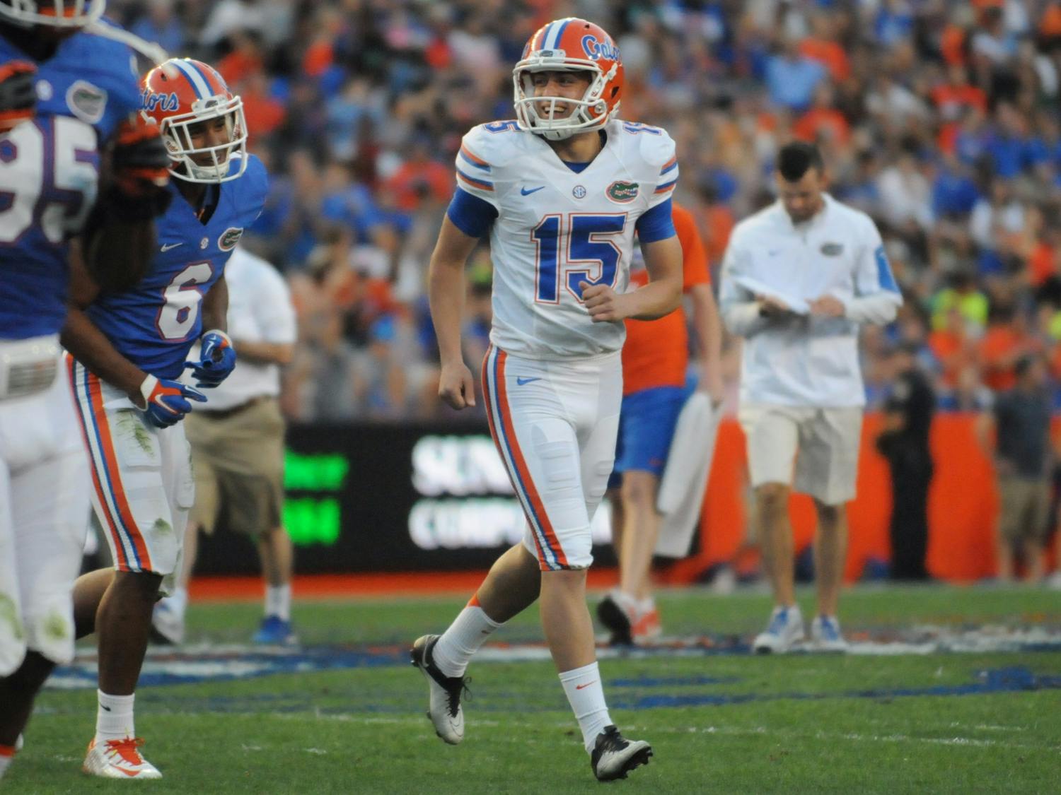 Eddy Pineiro (15) smiles as he walks off the field after making a field goal during the Orange & Blue Debut on April 8, 2016, at Ben Hill Griffin Stadium.