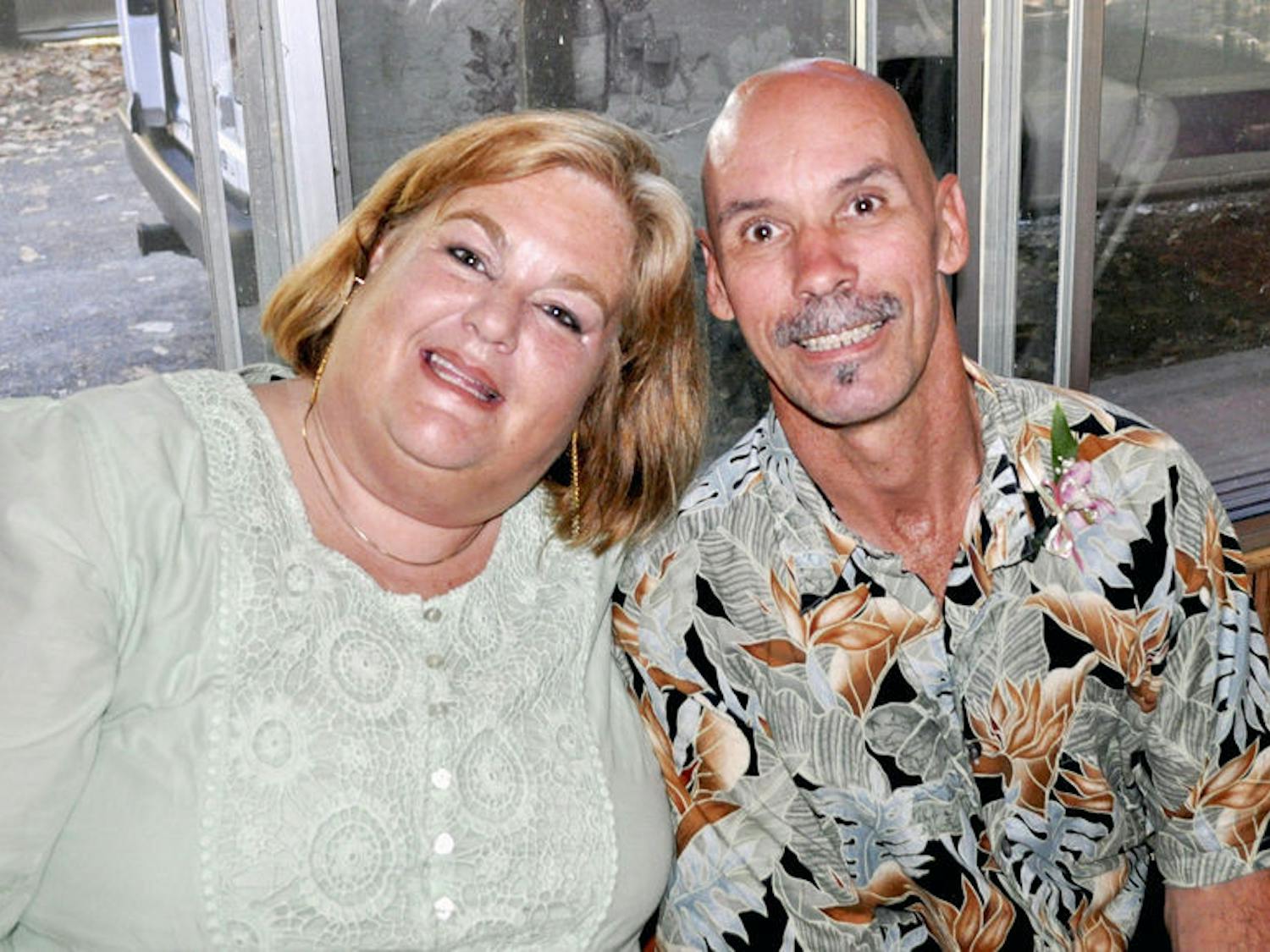 Gretchen Church (left), and Michael Church, both diagnosed with Parkinson’s disease at 32, pose for a photo. The Churches met through an online support group they started for people with Parkinson’s disease, which has grown into a non-profit called Movers and Shakers.