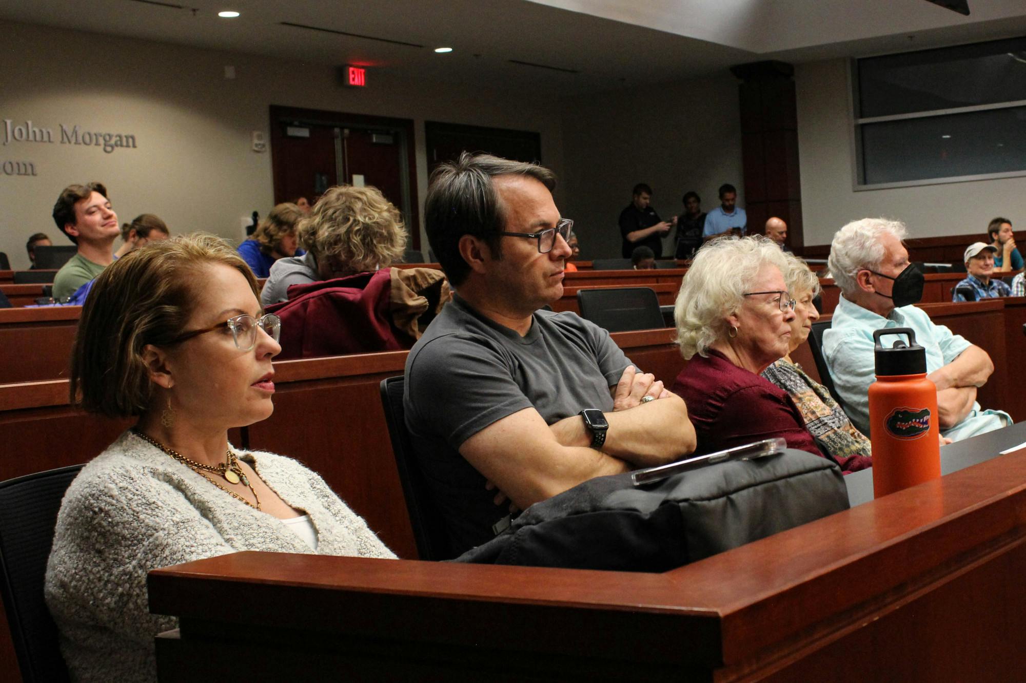 Attendees watch the mayoral debate between Harvey Ward and Ed Bielarski at UF Levin College of Law Tuesday, Oct. 25, 2022.