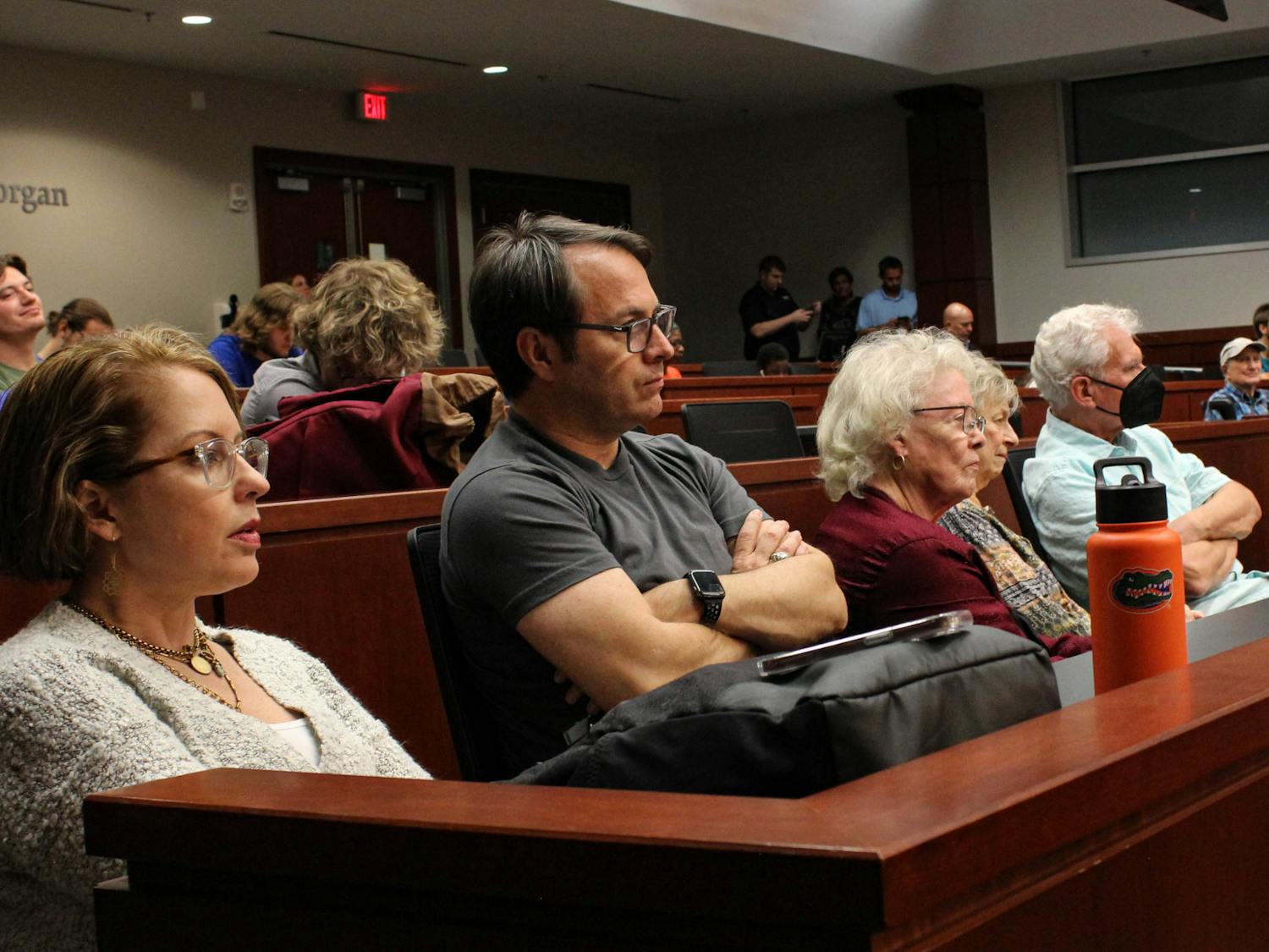 Attendees watch the mayoral debate between Harvey Ward and Ed Bielarski at UF Levin College of Law Tuesday, Oct. 25, 2022.