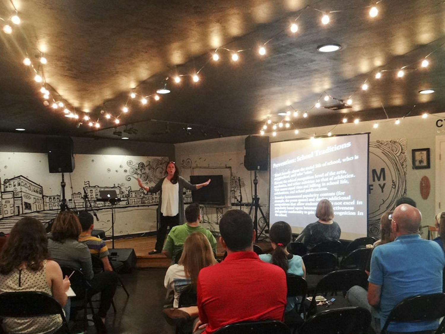 Leading LGBT researcher Elizabethe Payne speaks to a room of UF students and educators at a lecture held at Cymplify Central at 5402 NW Eighth Ave. for Gainesville Pride Days.