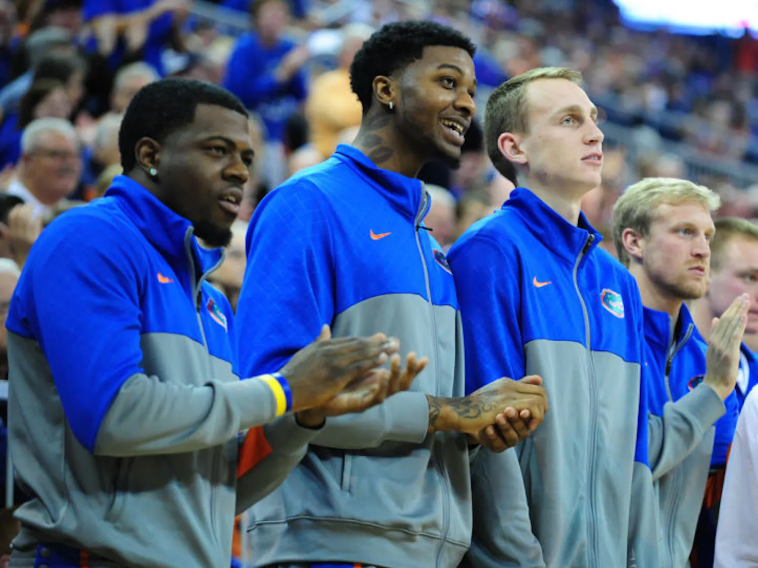 Chris Walker (middle) watches from the bench during Florida’s 74-58 win against South Carolina on Jan. 8 in the O’Connell Center. Walker is expected to make his college debut against Missouri tonight at 9 p.m.