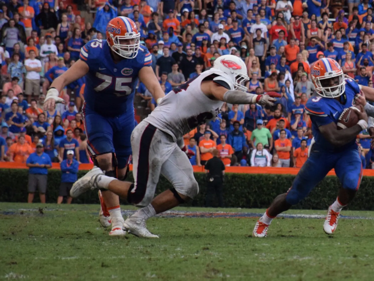 UF offensive lineman Mason Halter goes in for a block during Florida's 20-14 overtime win against Florida Atlantic on Nov. 21, 2015, at Ben Hill Griffin Stadium.